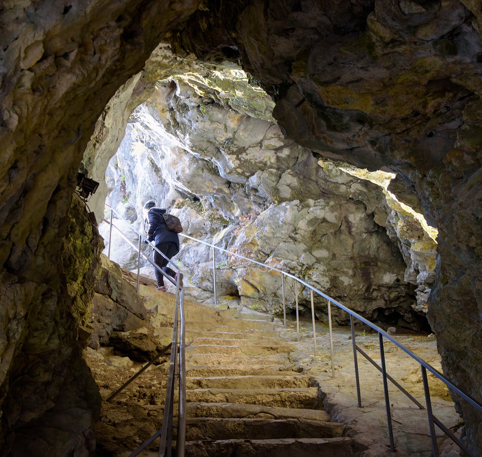 KT - People walking in a cave