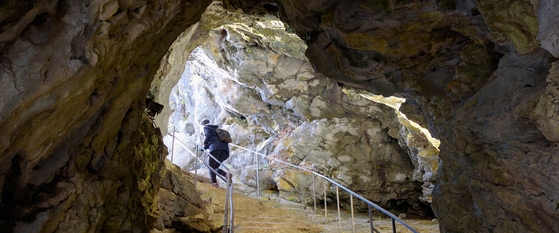 KT - People walking in a cave