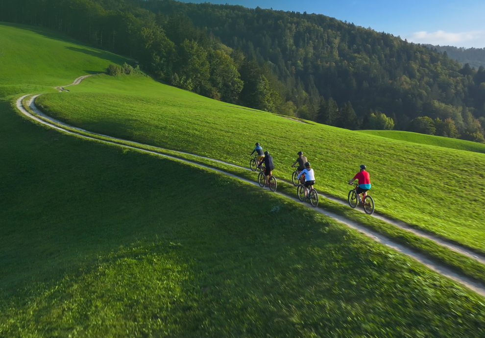 KT - People biking on a hill