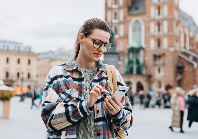 KT - Woman checking her phone