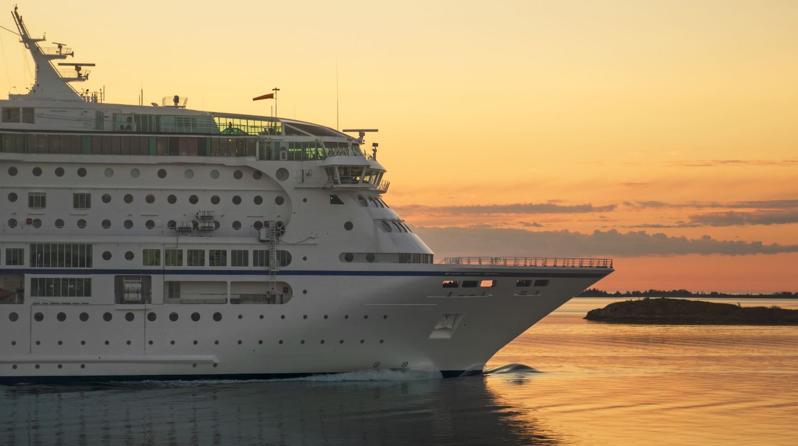 A passenger ferry crossing the Baltic Sea at sunset.