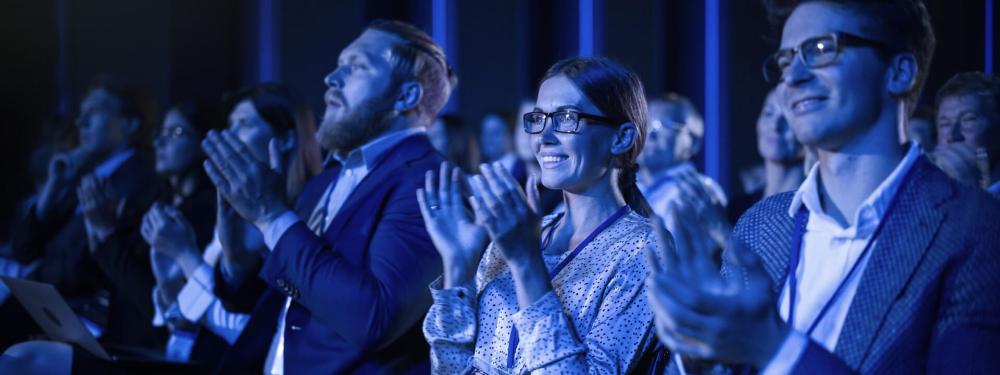 KT - Audience clapping in a convention