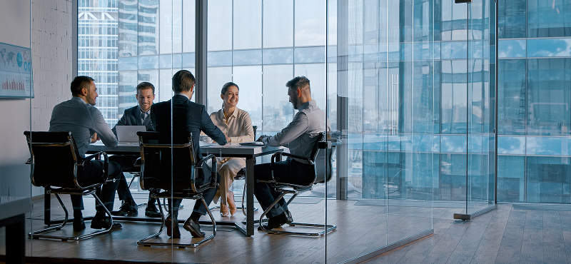 KT - A group of businessmen in a corporate Meetings