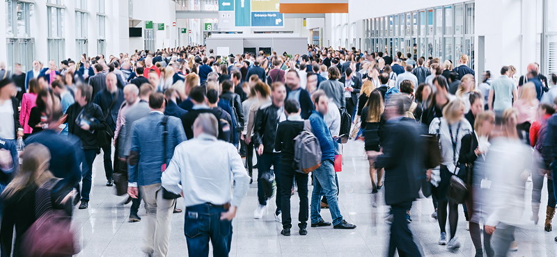 KT - People in a busy exhibitions event