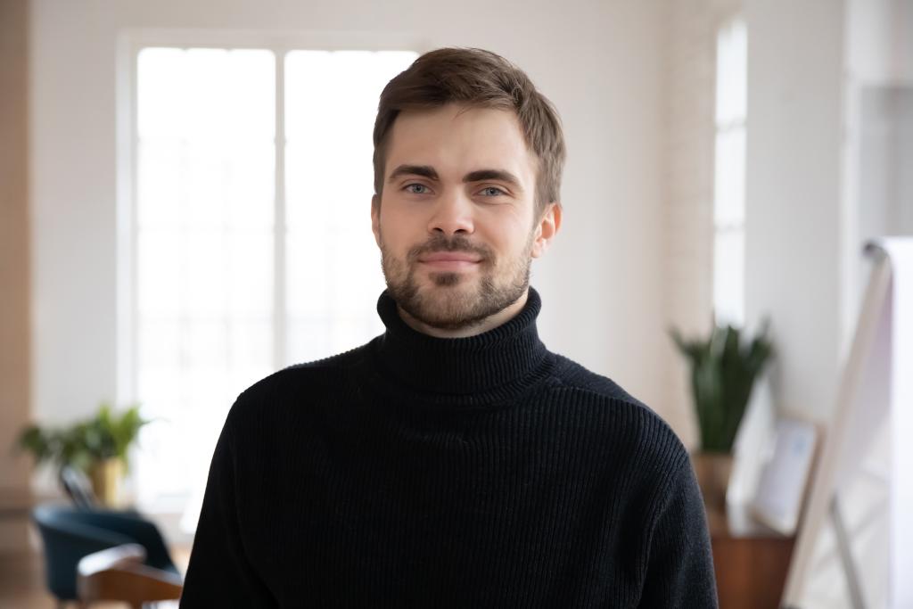 Employee in black jumper at the office